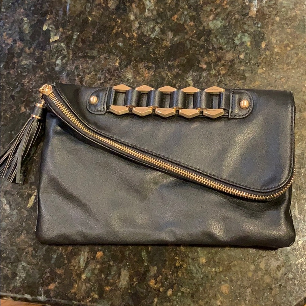 black clutch with gold hardware